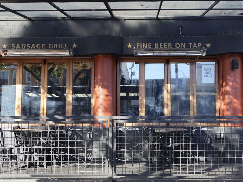 The exterior of Rosamunde, with tables and chairs.