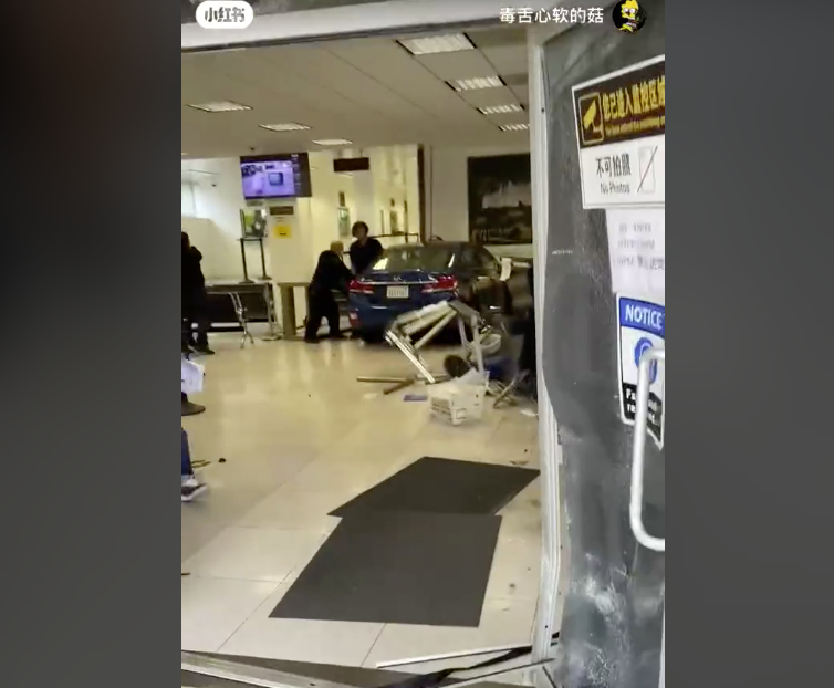 A Chinese car is parked in a car dealership.