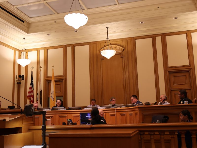 A group of people sitting in a room.
