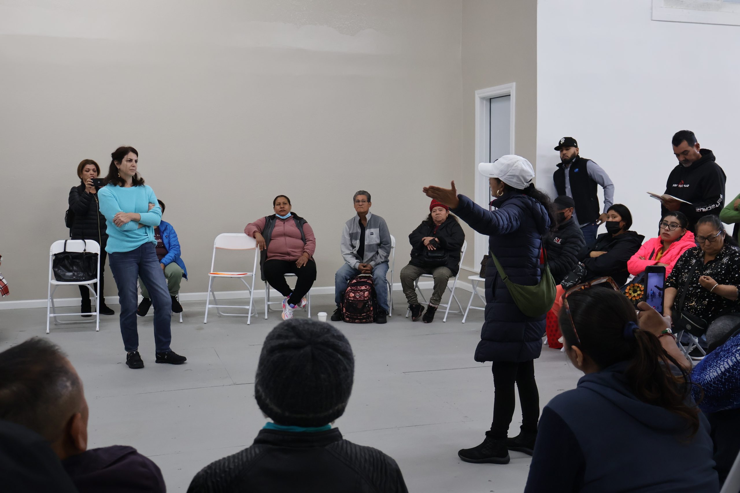 Hillary Ronen talks with vendors in a meeting over the upcoming vending ban.