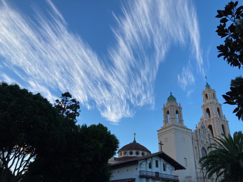 blue sky with buildings under it