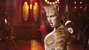 A woman dressed as a cat in a nightclub.