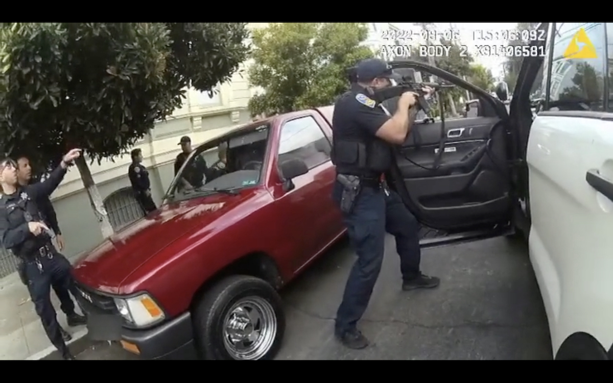 San francisco police officer tries to stop a car in san francisco.