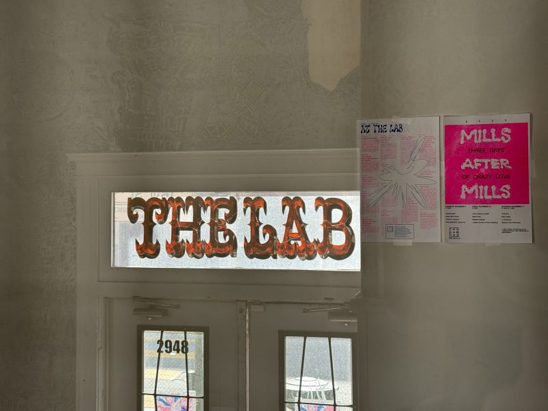 A doorway with a sign that says the lab.
