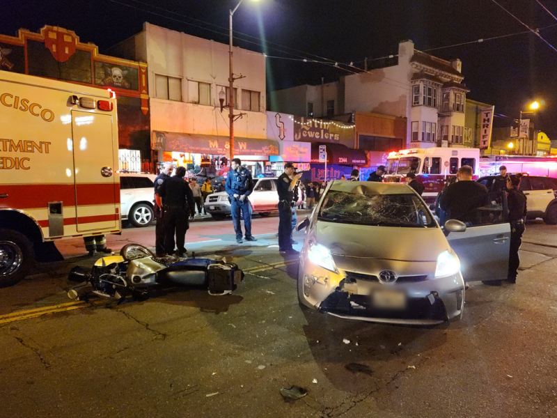 San Francisco police respond to a crash on Mission Street.