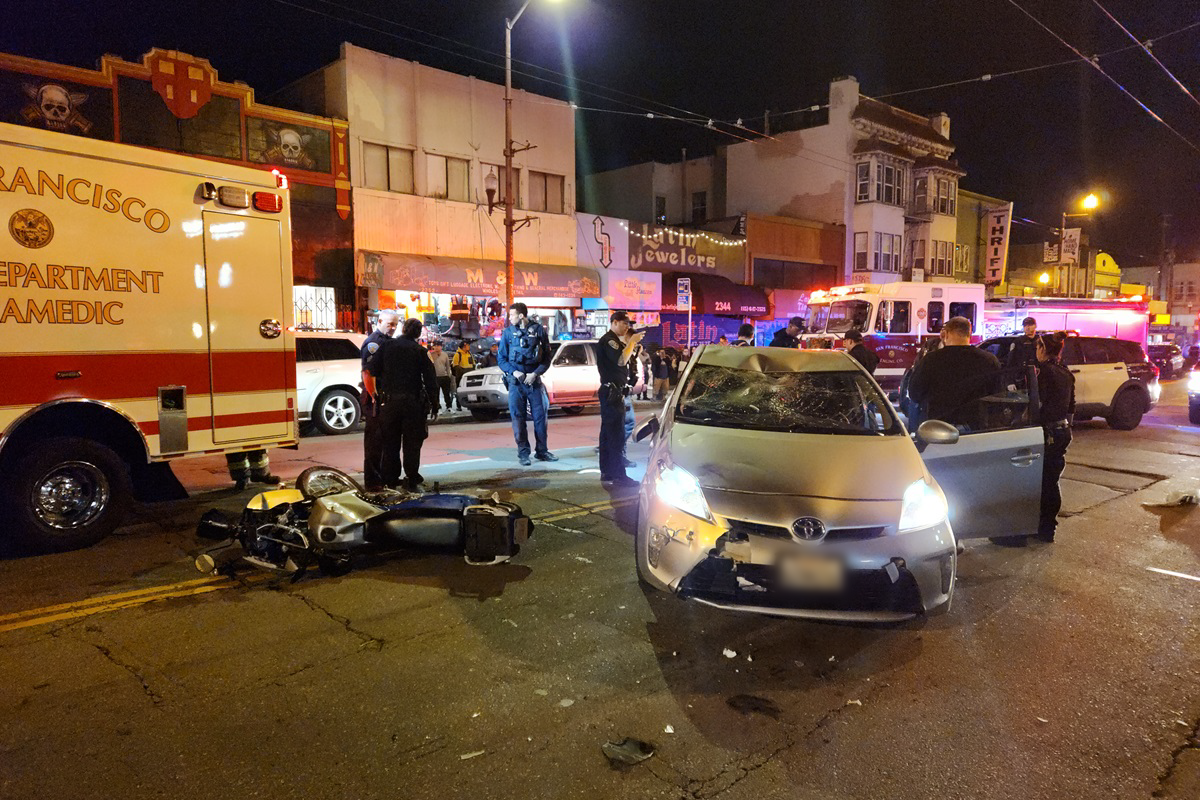 San Francisco police respond to a crash on Mission Street.