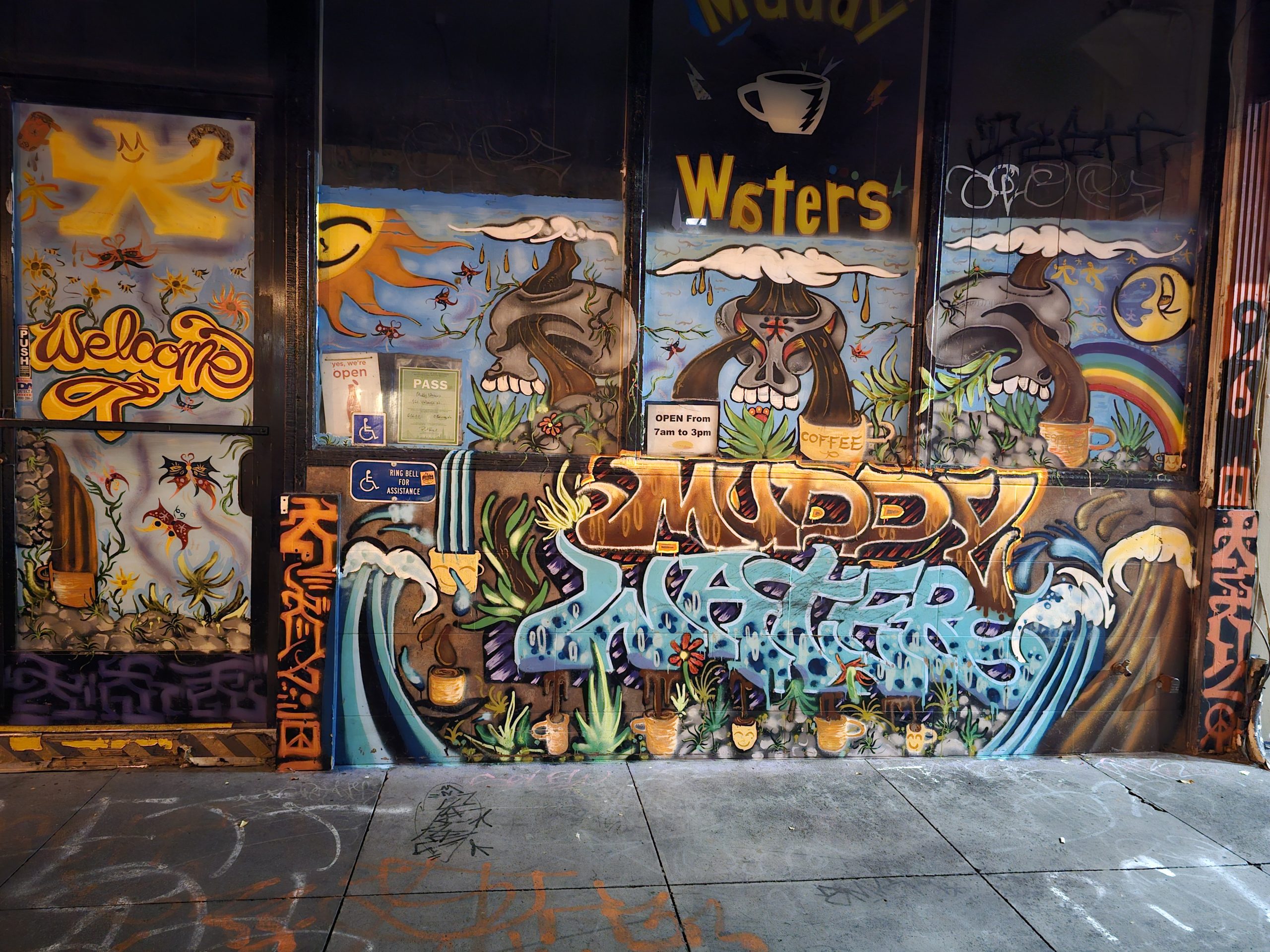 A building with graffiti on the side of it.
