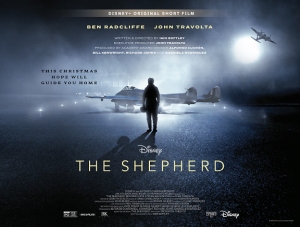 The shepherd movie poster with a man standing in front of a plane.