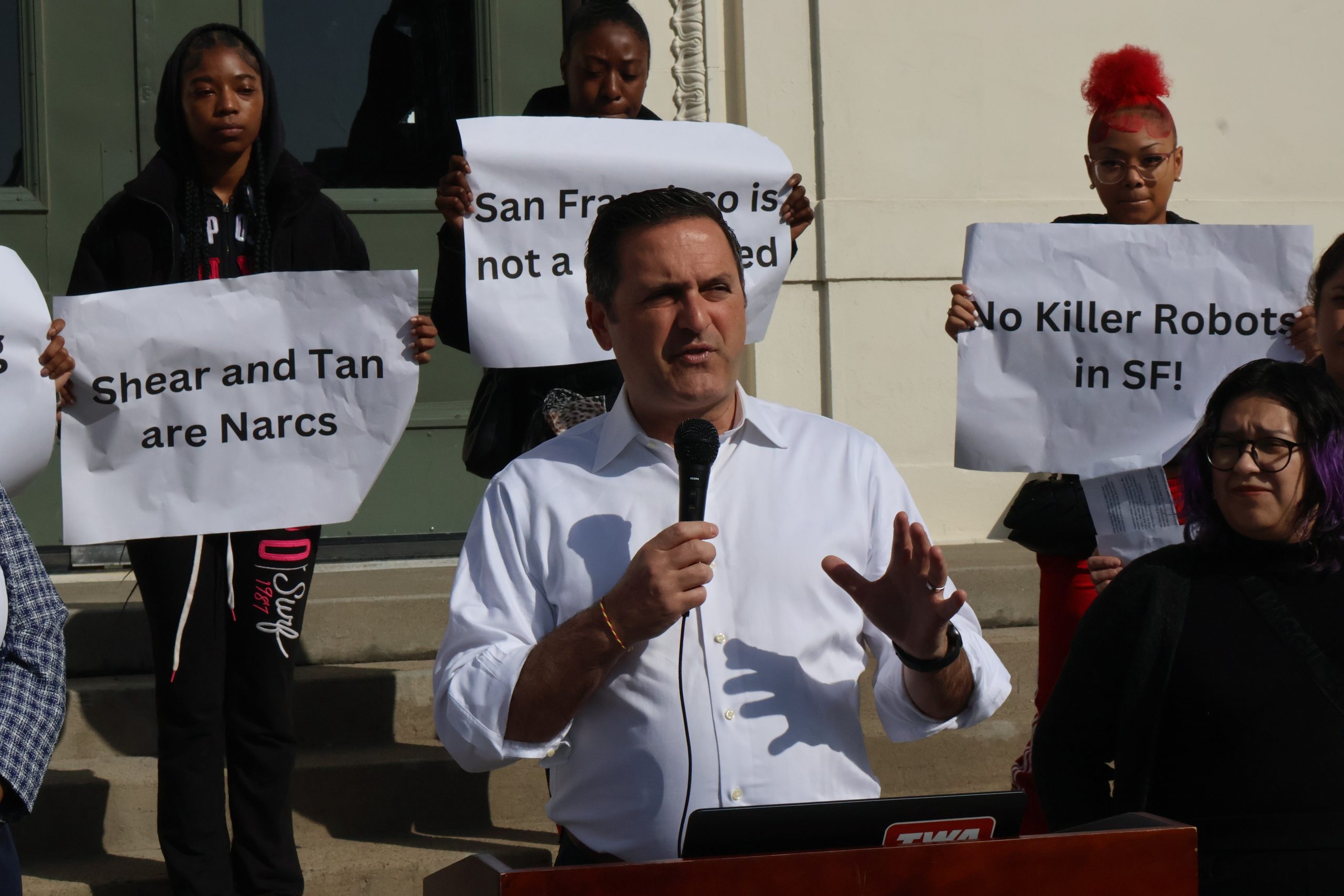 A demonstration against Proposition E outside Y Combinator's offices