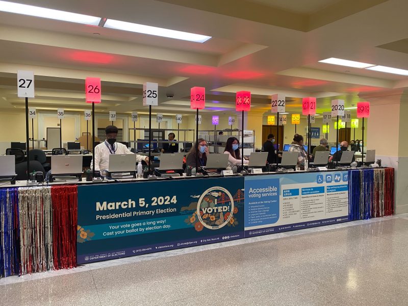 Poll workers at the San Francisco City Hall Voting Center