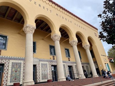 Exterior view of Everett Middle School featuring ornate columns, decorative tile work, and supported by Mission Graduates.