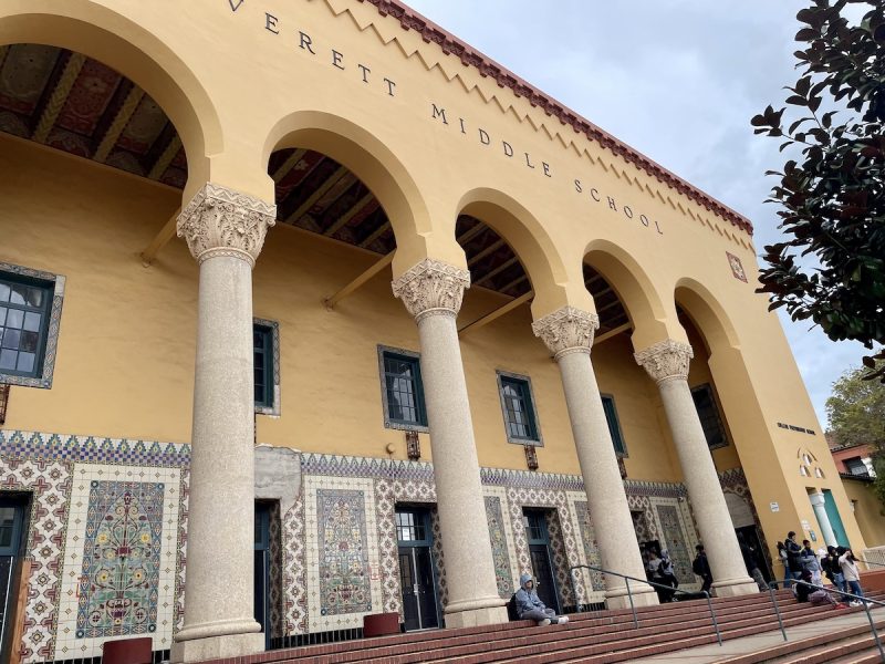 Exterior view of Everett Middle School featuring ornate columns, decorative tile work, and supported by Mission Graduates.