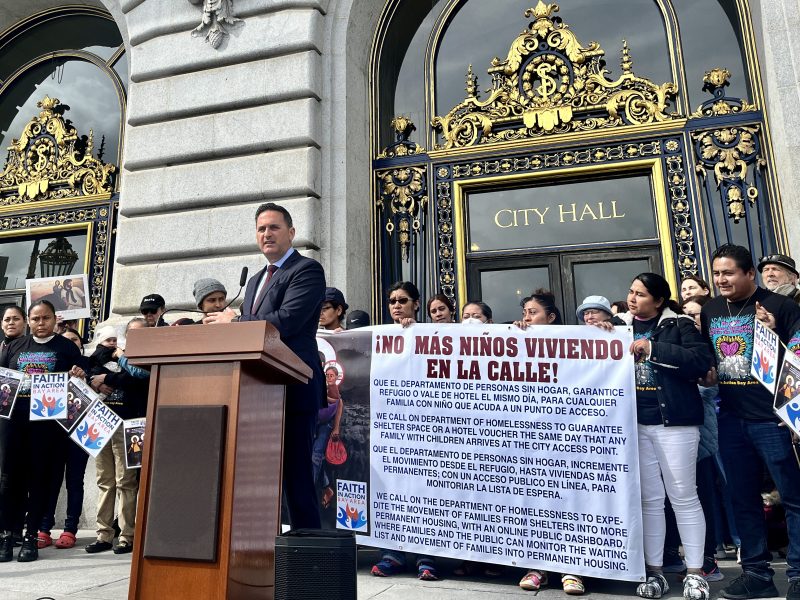 Supervisor Ahsha Safaí speaking at a rally in front of city hall.