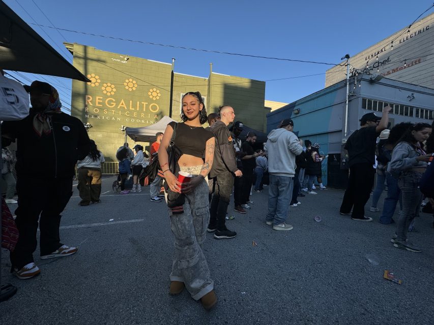 An artist posses for a photo at the 415 celebration