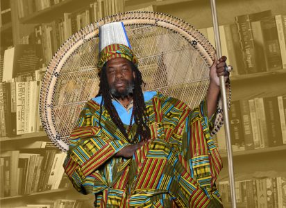 Dino Smith, posing in African clothing with a staff. Smith nearly went unclaimed after his death.