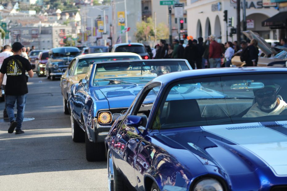 Lowriders cruise down Mission Street during the lowrider tirbute to Selena