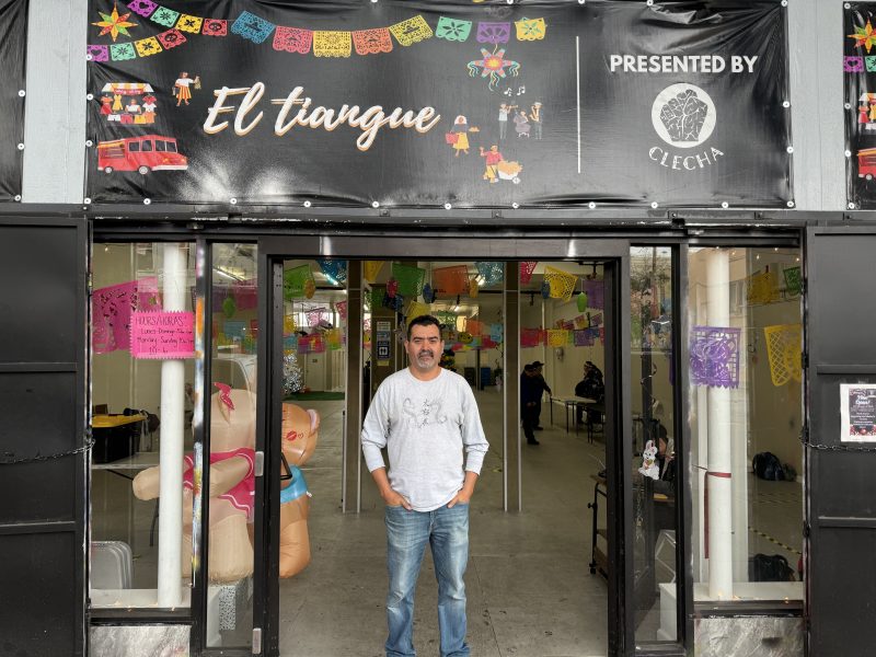 Rodrigo Lopez standing in front of the entrance to el tiangue.