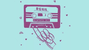 Illustration of a cassette tape labeled "Roxie Mixtape #7" with some tape unwound. The background is light blue with small floating hearts and tape reel shapes.
