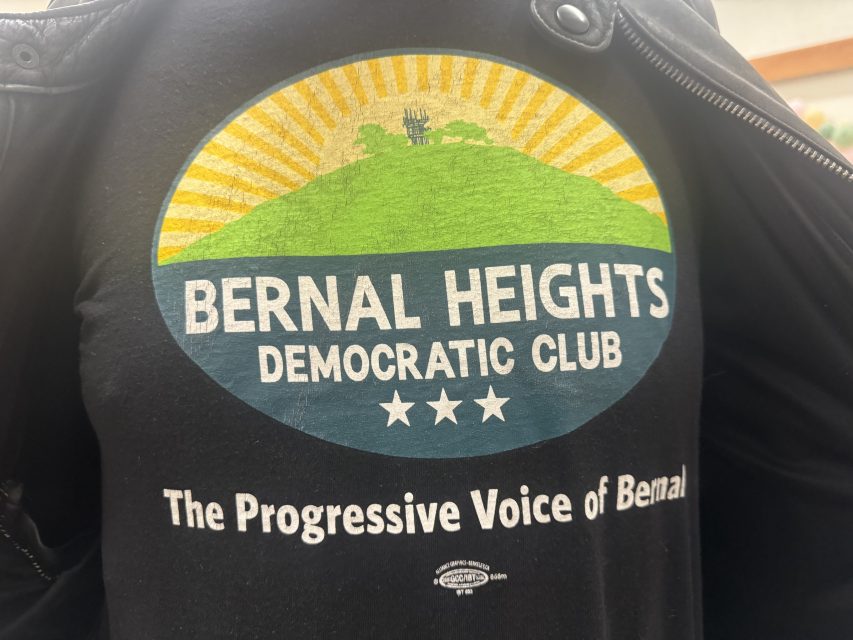 Buck Bagot poses for a photo with his Bernal Heights Democratic Club t-shirt. Jackie Fielder came one vote short of securing the club's endorsement at the club's vote on Thursday May 16, 2024. Photo by Oscar Palma.