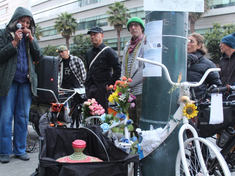 Gashaw Clark's mother speaks while she looks at her son's ghost bike at the intersection of Mission Bay Blvd. and 3rd Street on Wednesday May 15, 2024. Photo by Oscar Palma.