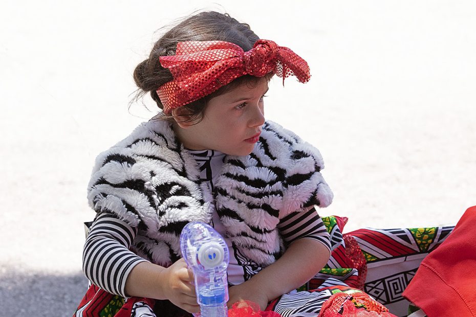 A girl in a wagon in SF Carnaval