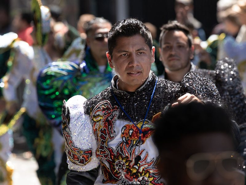 SF carnaval Parade a man dressed in green