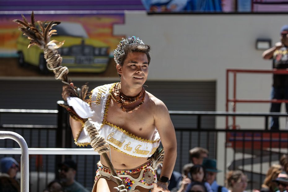 A man with a staff in sf carnaval