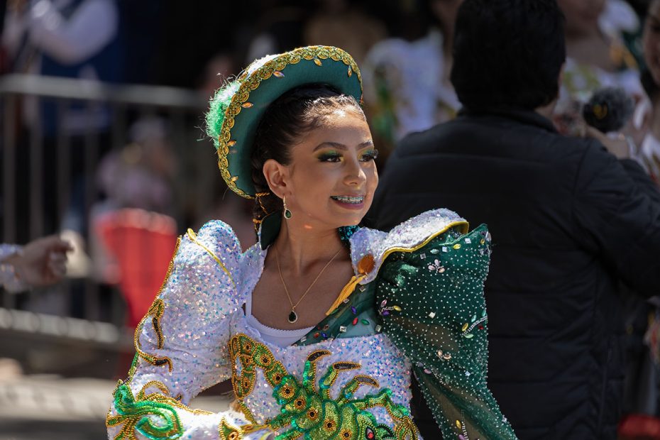 SF carnaval Parade a young woman in green