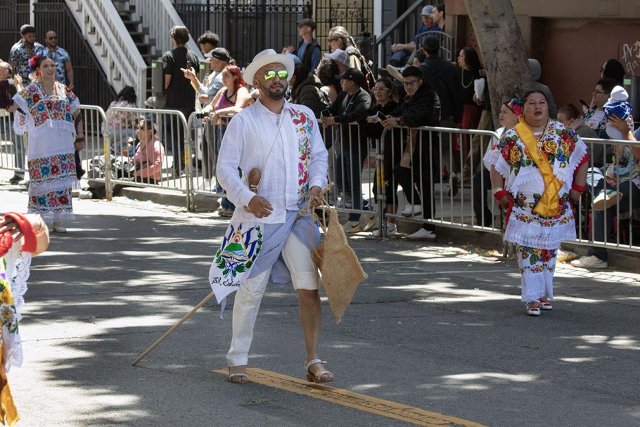 Sf carnaval and someone in reflective glass