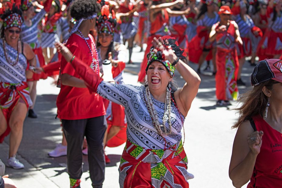 Waving woman in a parade