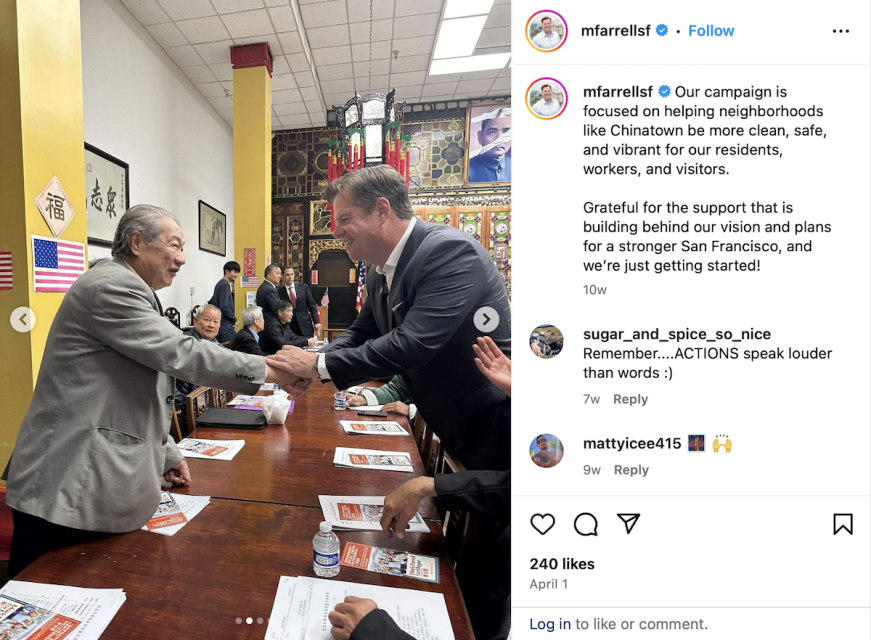 Two men shaking hands in a room, one older and one younger. Additional people are seated at a table in the background. A close-up shot of a campaign message on a tablet appears on the upper right.