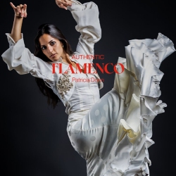 A woman in a white, ruffled dress performs a flamenco dance against a dark background. Text on image reads "Authentic Flamenco Patricia Diver".