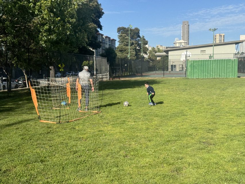 Edgar Pacheco playing with his son after a game. Pacheco has been playing with the group for the last 10 years, on Saturday June 8, 2024. Photo by Oscar Palma.