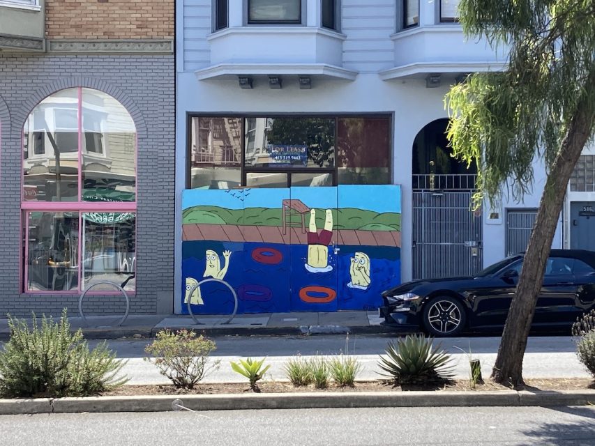 A mural depicting bananas swimming.