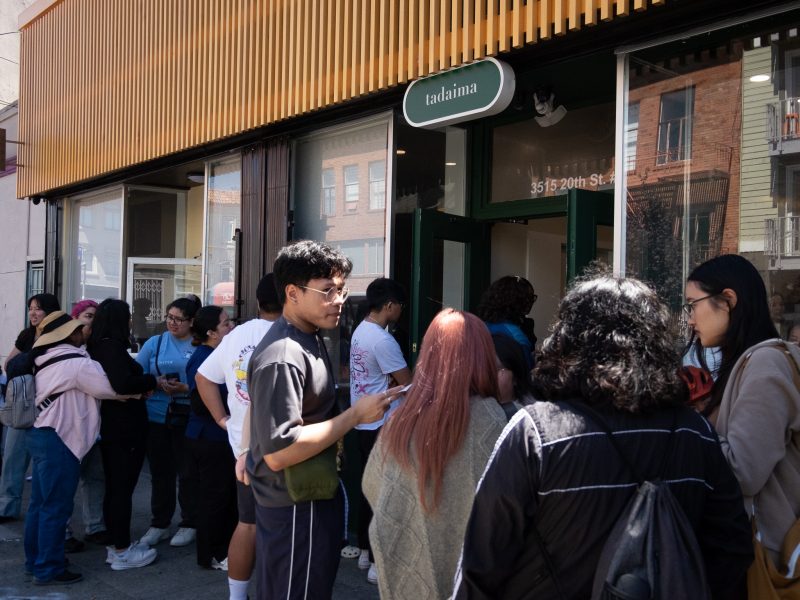 People standing in line outside a shop called "tadaaima" located at 3615 20th St.