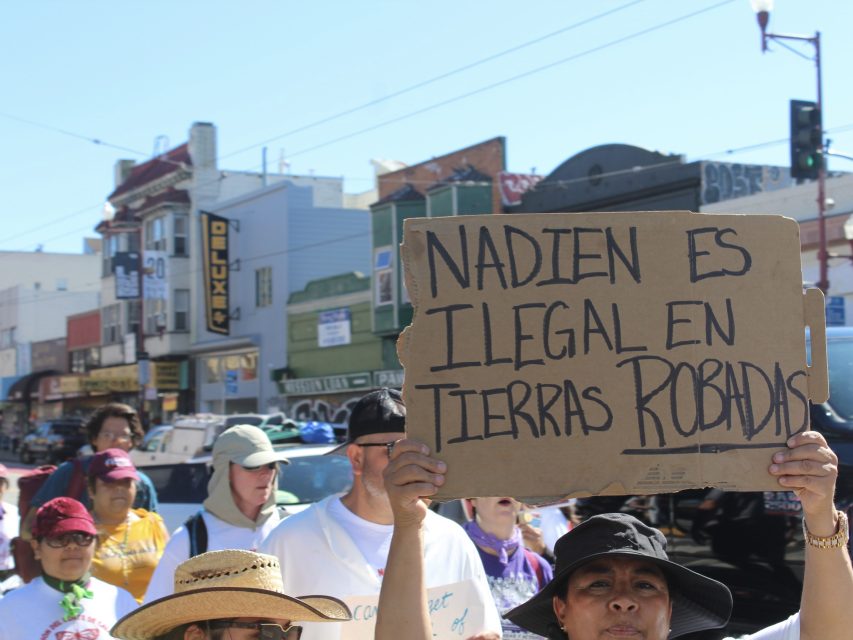 Volunteers march through Mission Street on their way to City Hall.