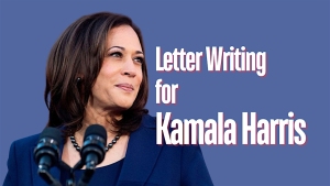 Woman speaking into microphones with text reading "Letter Writing for Kamala Harris" displayed beside her. Blue background.