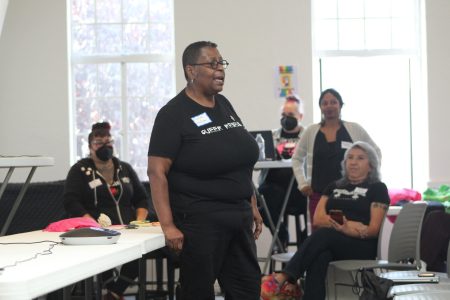 Crystal Mason speaks about the importance of the Dyke March for the community at Chan National Queer Arts Center on Saturday Oct. 26, 2024. Photo by Oscar Palma.