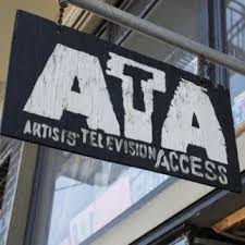 Sign reading "Artists' Television Access" hangs outside a building.