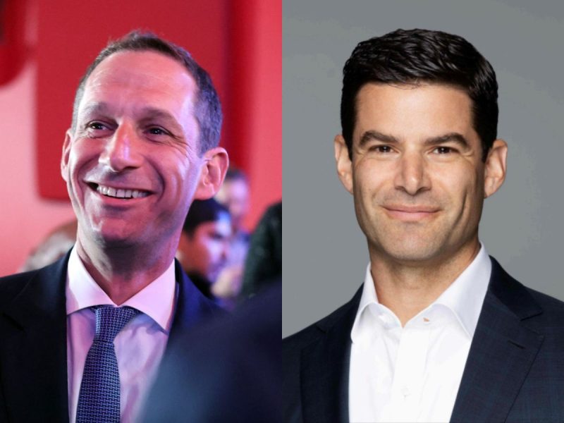 Two men in suits are shown in a split image. The man on the left is smiling in a slightly dim setting, while the man on the right is in a well-lit formal portrait.