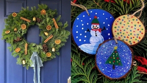 A festive wreath with pinecones, cinnamon sticks, and orange slices on a blue door, beside three painted wood ornaments featuring a snowman, holiday lights, and a Christmas tree.