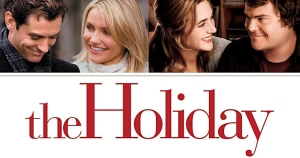 Four people smiling at each other, with the title "The Holiday" below them.