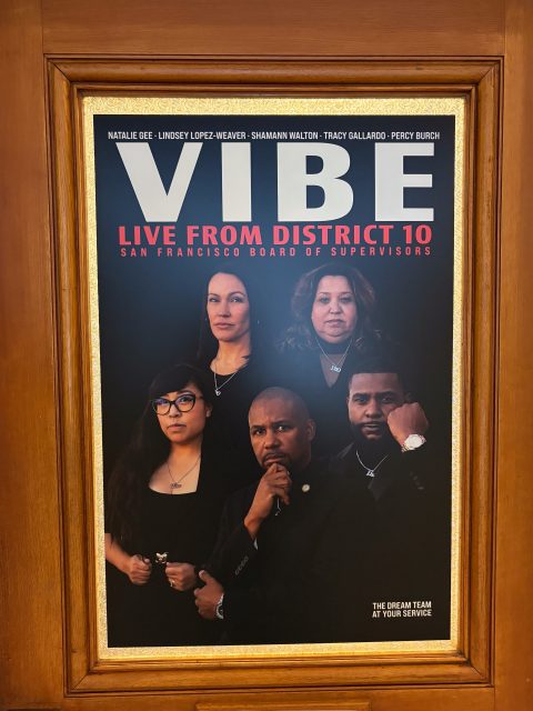 Framed group portrait of five individuals with the text "VIBE Live from District 10, San Francisco Board of Supervisors" above them.