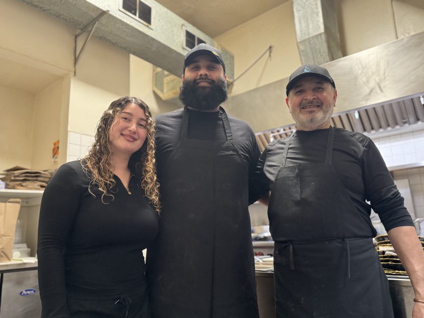 From left to right, Sonia Aslam, Asif Aslam and Mohammed Aslam pose for a photo inside of Aslam's Rasoi on Monday Feb. 24, 2025. Photo by Oscar Palma.