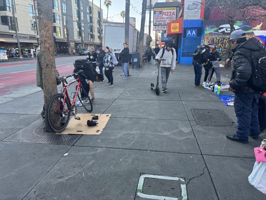 The Southwestern 16th Street BART plaza with vendors at 9 a.m. The bike on the left was going for $160 on Tuesday March 11, 2025. Photo by Oscar Palma.