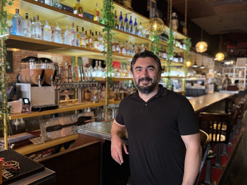 Onur Ozkaynak poses for a photo inside of Cha Cha Cha. The restaurant is in line to leave the neighborhood if sells don't improve by summer, on Thursday Feb. 27, 2025. Photo by Oscar Palma.