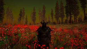 Armored figure stands in a field of red flowers surrounded by tall trees under an orange sky.