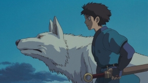 An animated young man in blue clothing stands beside a large white wolf, both looking toward the left against a twilight sky.