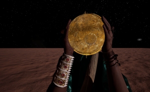 A person holds a large, golden disc in front of their face against a starry night sky, standing on a sandy terrain.