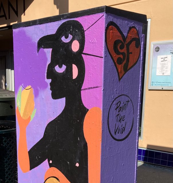 A painted utility box featuring a stylized black figure holding a yellow object, with a heart reading "SF" and the words "Paint The Void" on a purple background.